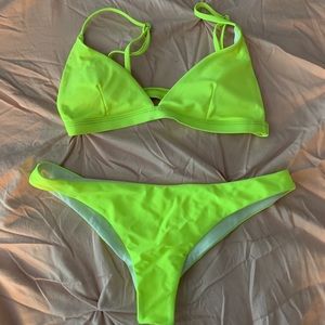 Neon Yellow bathing suit.
